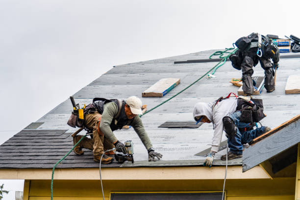 Professional Roof Replacement technician working in Mapleville, RI